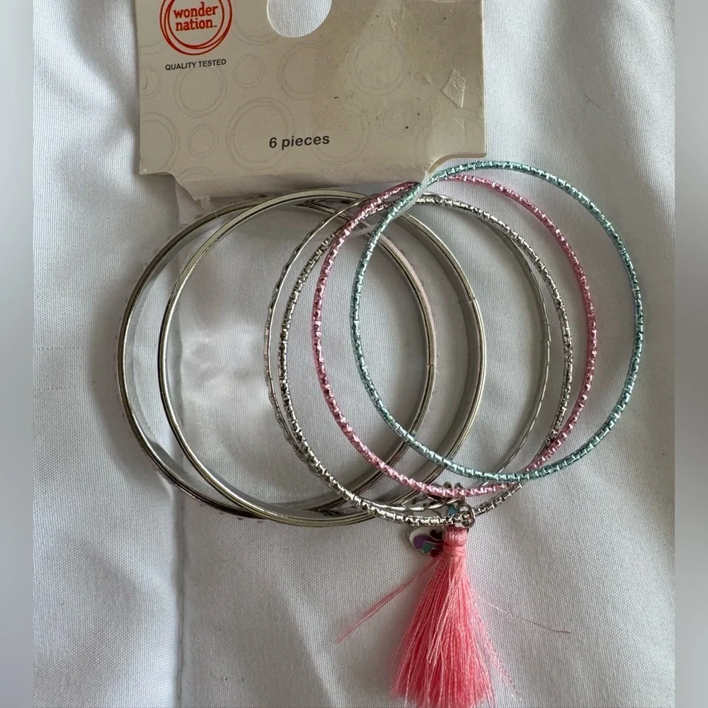 Assorted Jewelry Set with Earrings, Bracelets, and Rings